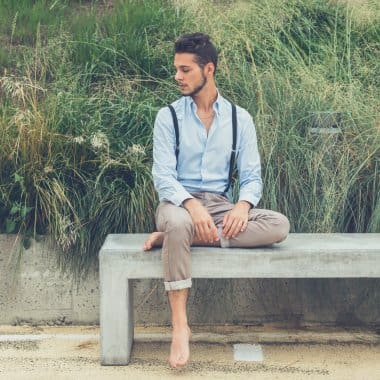 depositphotos 85678720 stock photo young handsome man sitting on