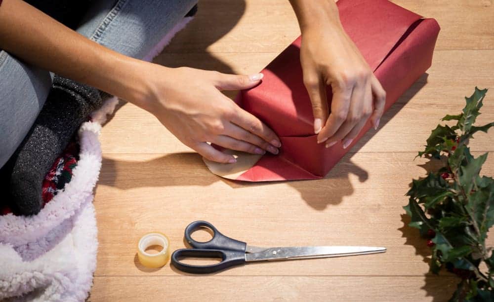 How To Make A Sash Without Sewing In 6 Easy Step? 2 high angle wrapping gifts tradition christmas