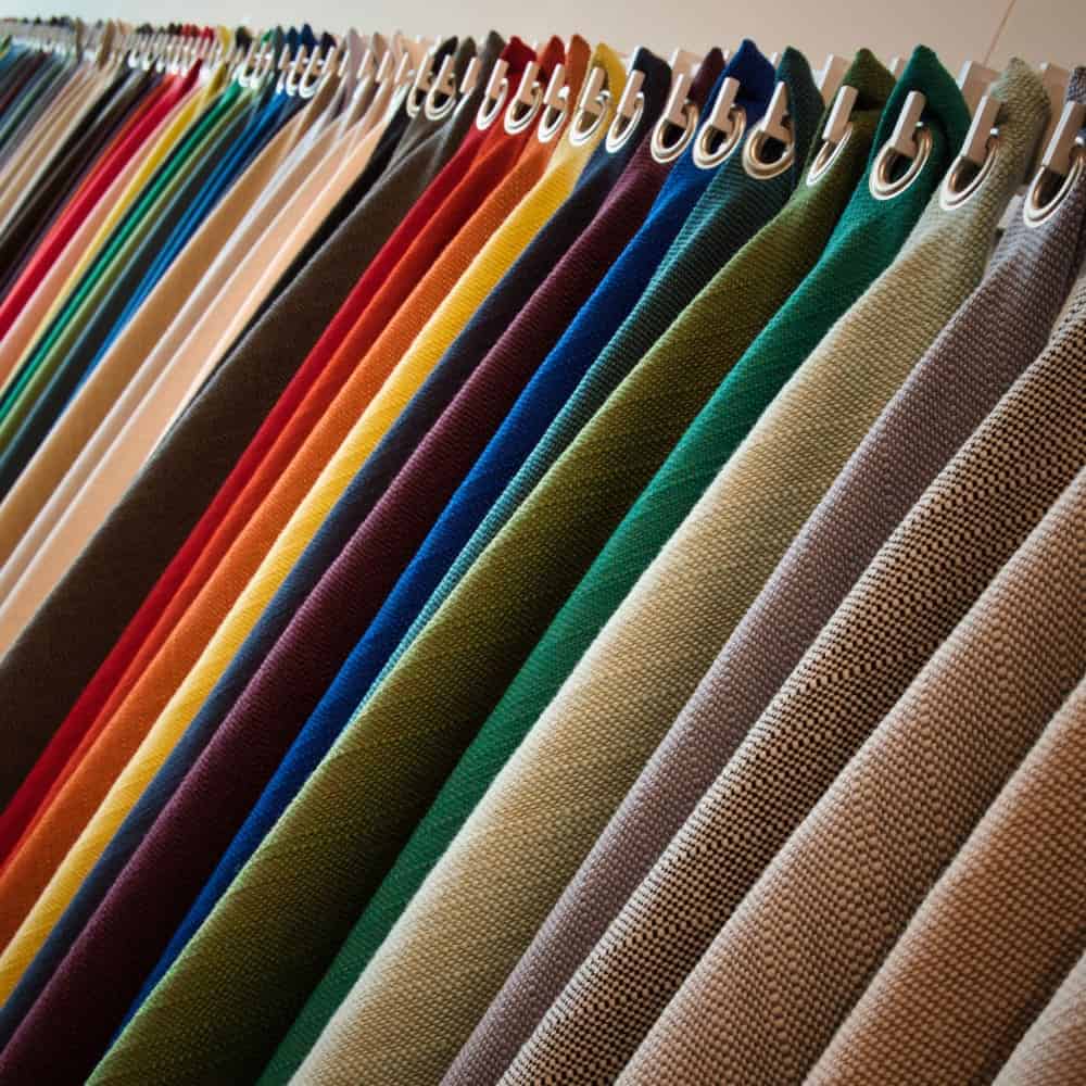 An Easy Guide On How To Sew Sunbrella Fabric 1 line hanging textured fabrics different colors shades