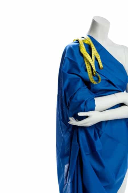 mannequin with tape measure
