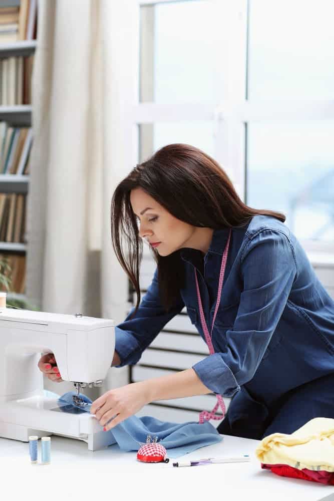 seamstress working home
